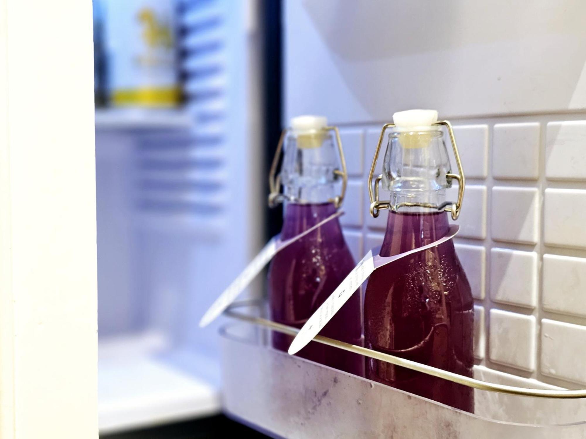 The Sukosol Hotel Bangkok Kültér fotó Bottles of blueberry juice